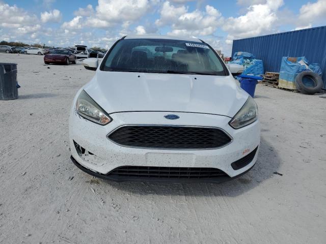 Photo 5 from auction – 2015 FORD FOCUS SE with VIN 1FADP3F28FL248503