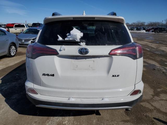 Photo 6 from auction – 2017 TOYOTA RAV4 XLE with VIN JTMWFREV4HD102469