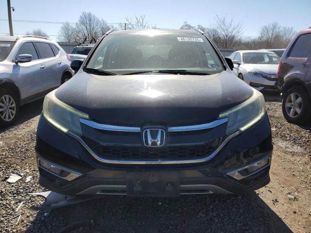Photo 5 from auction – 2015 HONDA CR-V with VIN 2HKRM4H71FH671757