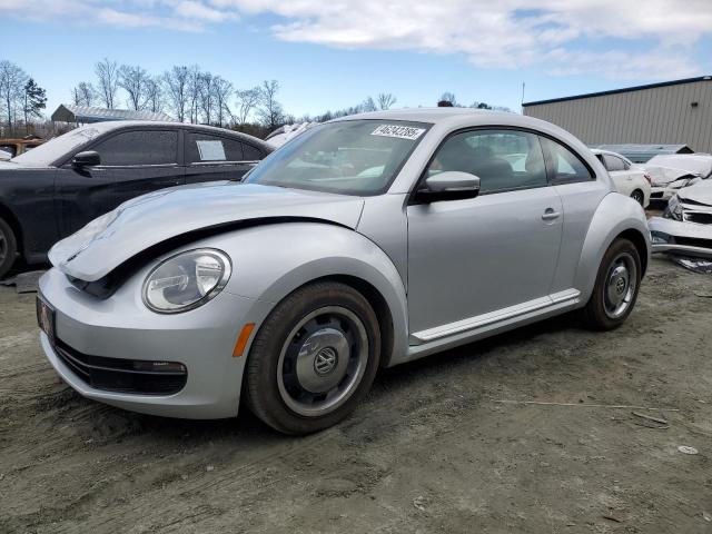 VOLKSWAGEN BEETLE 2012 with VIN 3VWHP7AT5CM618672 - Photo from auction
