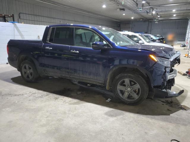 Photo 4 from auction – 2023 HONDA RIDGELINE with VIN 5FPYK3F73PB002850