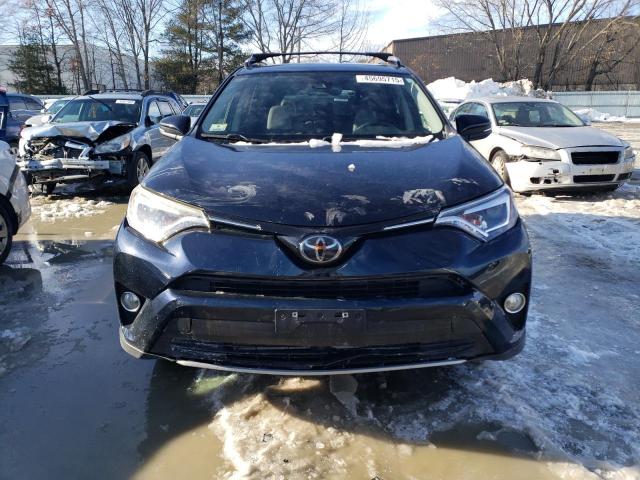 Photo 5 from auction – 2018 TOYOTA RAV4 LIMIT with VIN JTMDFREV6JD233304