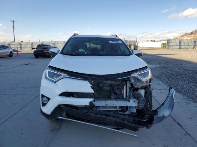 Photo 5 from auction – 2016 TOYOTA RAV4 XLE with VIN JTMWFREV0GJ060415