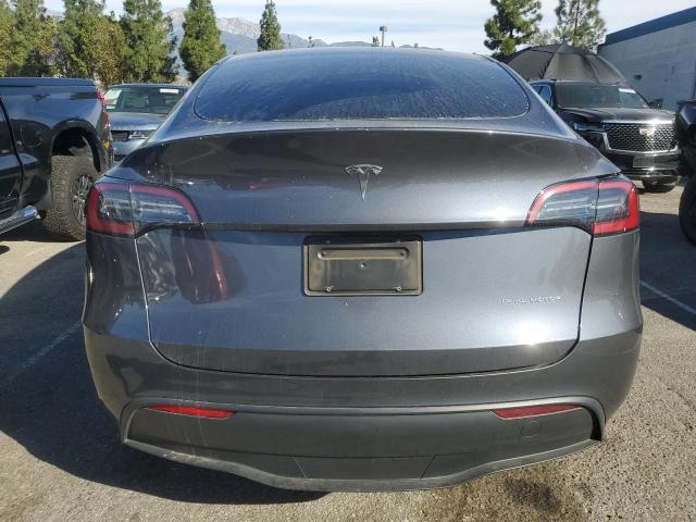 Снимка 6 от търг – 2023 TESLA MODEL Y с VIN 7SAYGDEE0PF840532