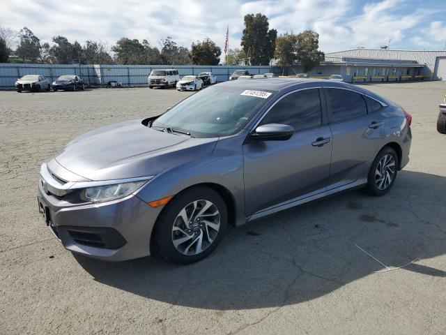 HONDA CIVIC EX 2017 with VIN 19XFC2F78HE202881 - Photo from auction