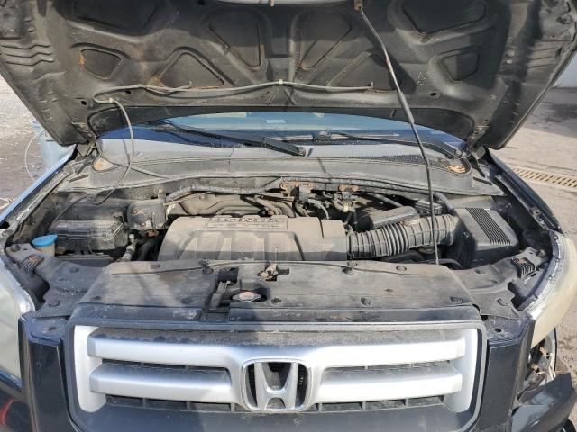 Photo 12 from auction – 2007 HONDA PILOT LX with VIN 2HKYF18167H508118