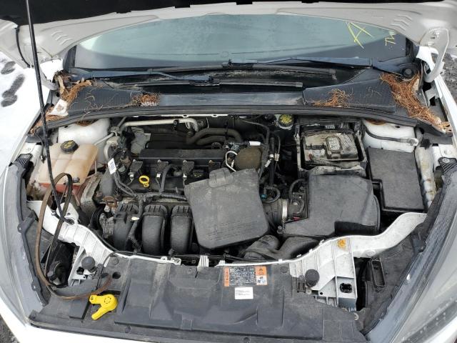 Photo 11 from auction – 2015 FORD FOCUS SE with VIN 1FADP3F29FL303797