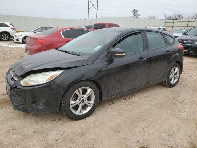 FORD FOCUS SE 2014 with VIN 1FADP3K24EL400975 - Photo from auction