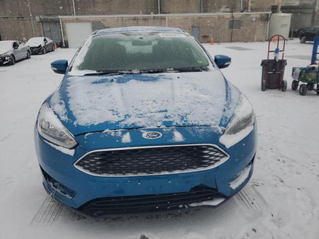 Photo 5 from auction – 2016 FORD FOCUS SE with VIN 1FADP3K28GL382189