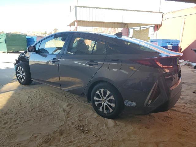 Photo 2 from auction – 2021 TOYOTA PRIUS PRIM with VIN JTDKAMFP5M3174409