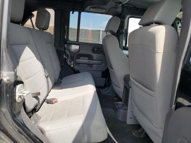 Photo 11 from auction – 2009 JEEP WRANGLER U with VIN 1J4GA59159L781690