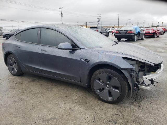 Photo 4 from auction – 2022 TESLA MODEL 3 with VIN 5YJ3E1EB8NF323669