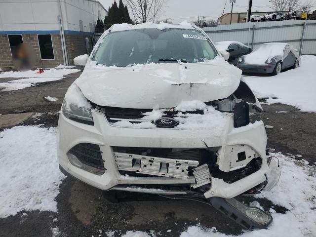Photo 5 from auction – 2016 FORD ESCAPE TIT with VIN 1FMCU9J90GUC70945