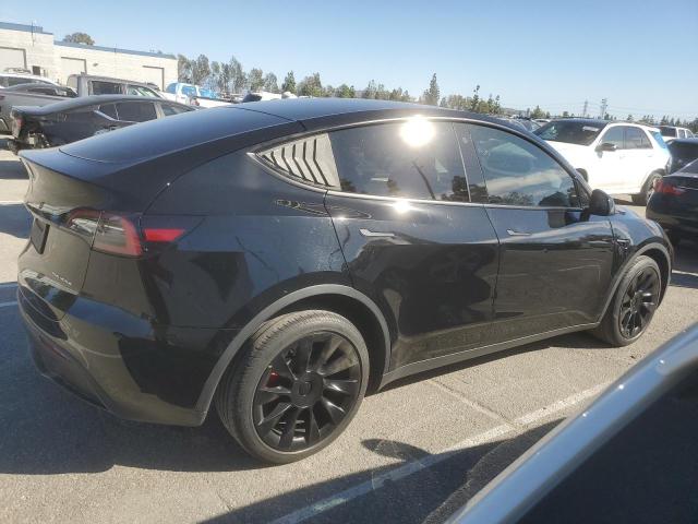 Photo 3 from auction – 2023 TESLA MODEL Y with VIN 7SAYGDEE4PA025344