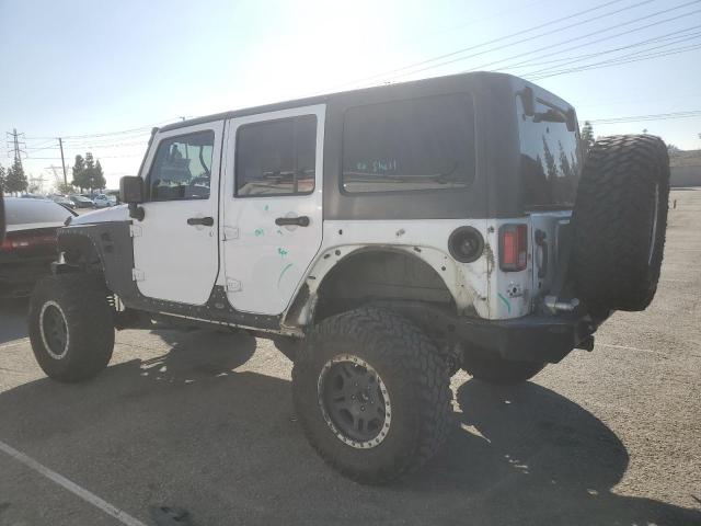 Photo 2 from auction – 2014 JEEP WRANGLER U with VIN 1C4BJWDG8EL179037