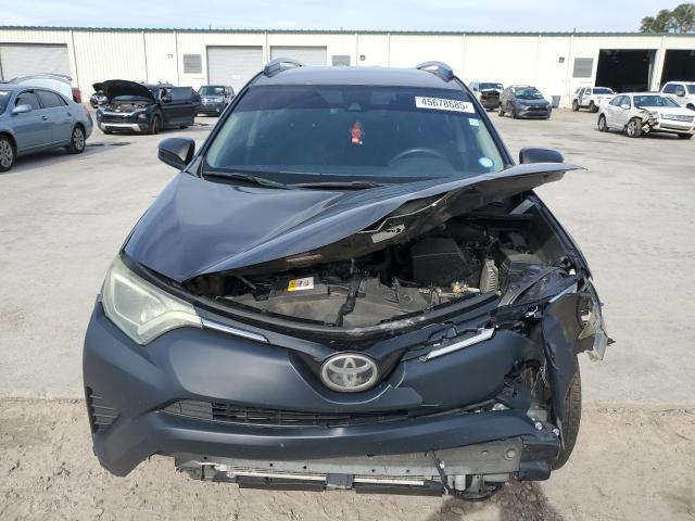 Photo 5 from auction – 2017 TOYOTA RAV4 LE with VIN JTMZFREV6HJ710394
