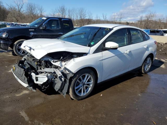 FORD FOCUS SE 2017 with VIN 1FADP3F21HL215846 - Photo from auction