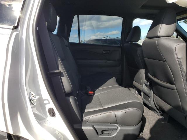 Photo 11 from auction – 2023 HONDA PASSPORT E with VIN 5FNYF8H50PB016520