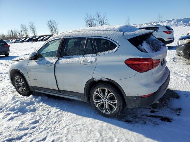 Photo 2 from auction – 2017 BMW X1 XDRIVE2 with VIN WBXHT3C33H5F79099