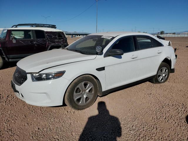 FORD TAURUS POL 2015 with VIN 1FAHP2MK5FG149449 - Photo from auction