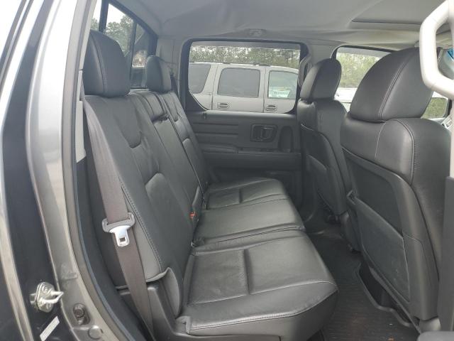 Photo 10 from auction – 2010 HONDA RIDGELINE with VIN 5FPYK1F50AB006171