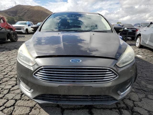 Photo 5 from auction – 2015 FORD FOCUS TITA with VIN 1FADP3N20FL324555