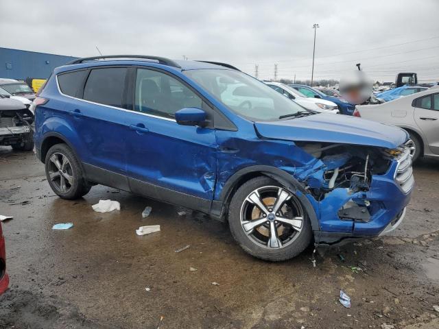 Photo 4 from auction – 2017 FORD ESCAPE SE with VIN 1FMCU9G99HUA91764