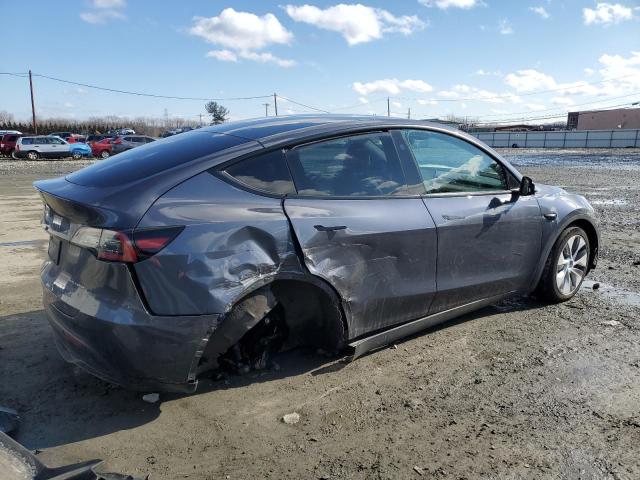 Снимка 3 от търг – 2023 TESLA MODEL Y с VIN 7SAYGDEE1PF842242