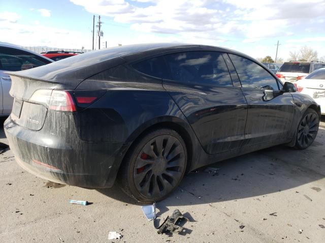 Снимка 3 от търг – 2022 TESLA MODEL 3 с VIN 5YJ3E1EC2NF253739