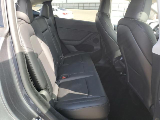 Photo 11 from auction – 2023 TESLA MODEL Y with VIN 7SAYGDEE9PF858527