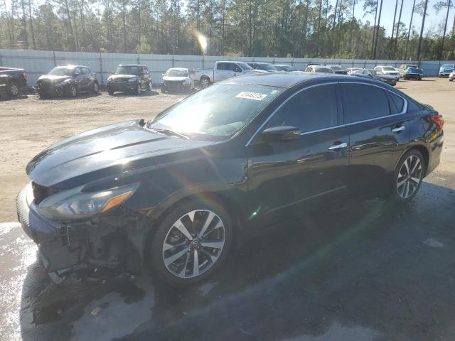NISSAN ALTIMA 2.5 2016 with VIN 1N4AL3AP9GC141365 - Photo from auction