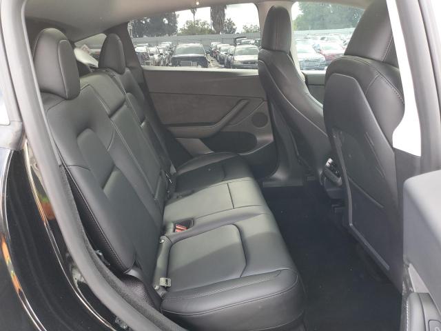 Photo 11 from auction – 2023 TESLA MODEL Y with VIN 7SAYGDEF5PF959959