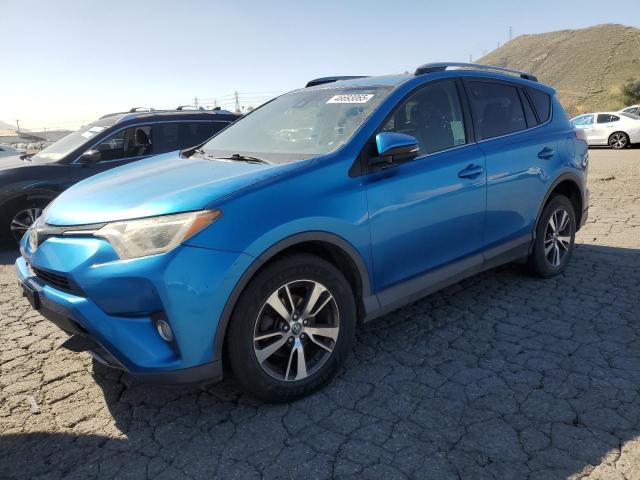 TOYOTA RAV4 XLE 2017 with VIN JTMWFREV9HD098919 - Photo from auction