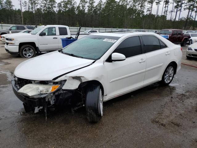 TOYOTA CAMRY L 2014 with VIN 4T1BF1FK9EU802774 - Photo from auction