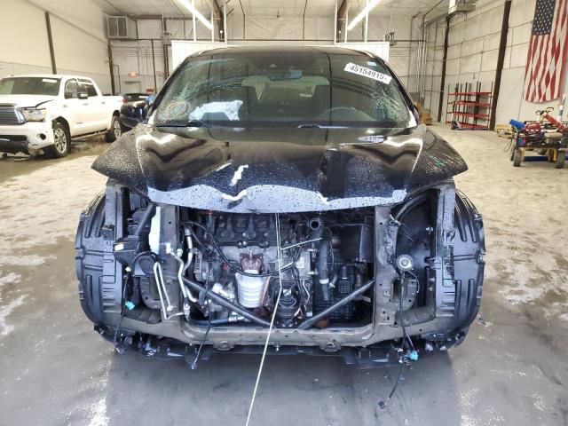 Photo 5 from auction – 2021 HONDA PASSPORT E with VIN 5FNYF8H56MB032927