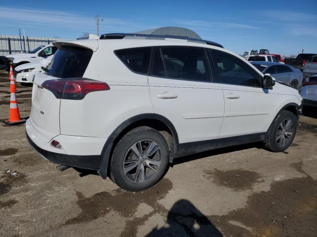 Photo 3 from auction – 2017 TOYOTA RAV4 XLE with VIN JTMWFREV4HD102469