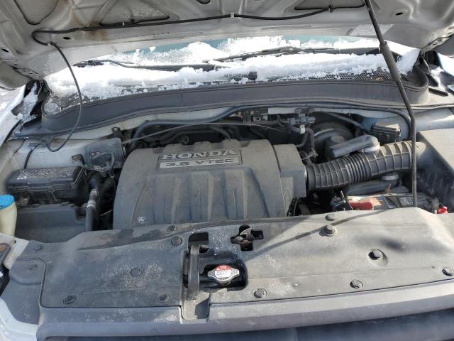 Photo 12 from auction – 2005 HONDA PILOT EXL with VIN 5FNYF18615B033307