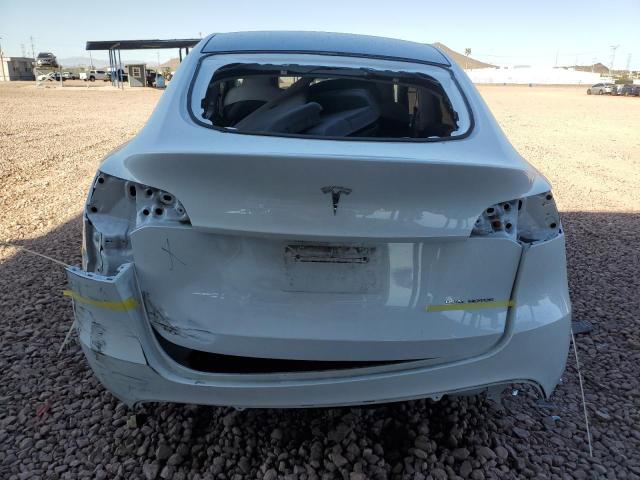 Снимка 6 от търг – 2023 TESLA MODEL Y с VIN 7SAYGDEE2PA140699