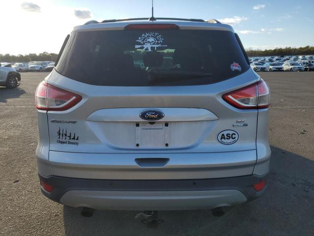 Photo 6 from auction – 2014 FORD ESCAPE SE with VIN 1FMCU9G96EUD90883
