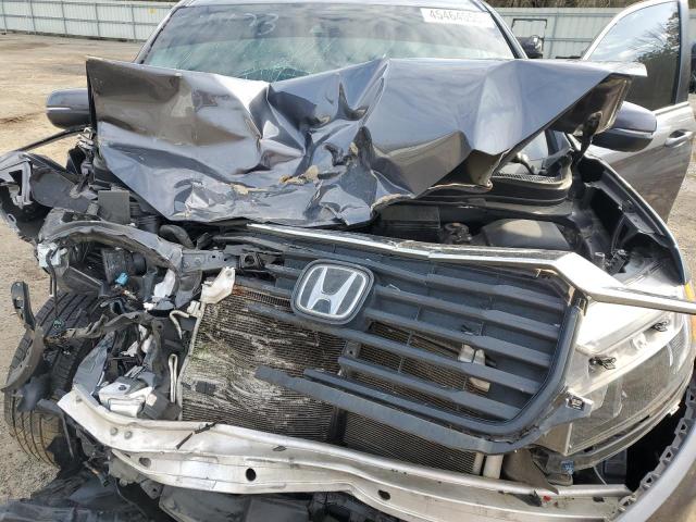 Снимка 11 от търг – 2023 HONDA RIDGELINE с VIN 5FPYK3F59PB032871