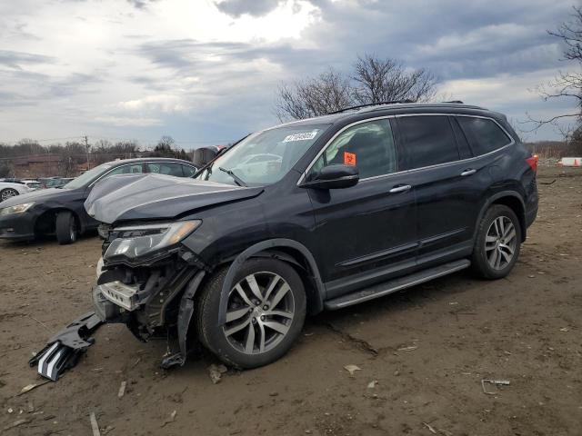 HONDA PILOT TOUR 2016 with VIN 5FNYF6H92GB004411 - Photo from auction