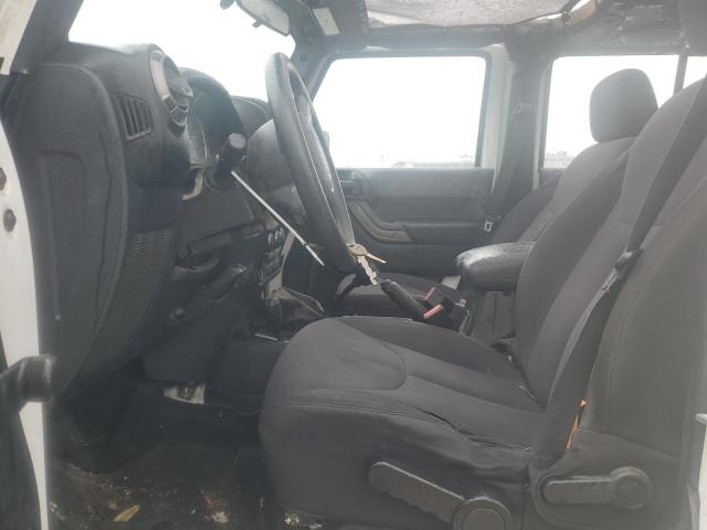 Photo 7 from auction – 2014 JEEP WRANGLER U with VIN 1C4BJWDG0EL210281