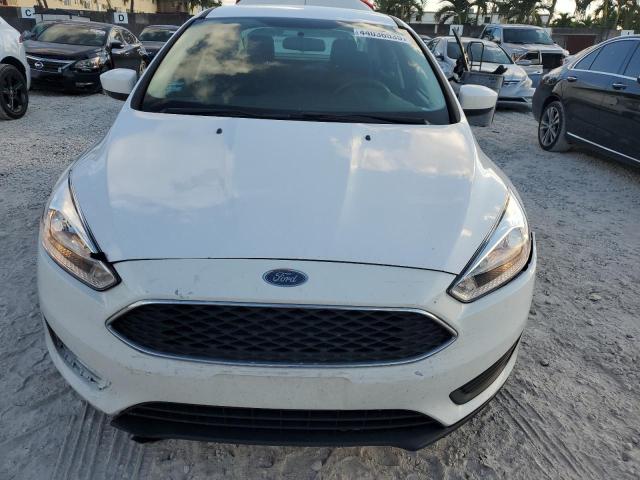 Photo 5 from auction – 2018 FORD FOCUS SE with VIN 1FADP3F23JL262348