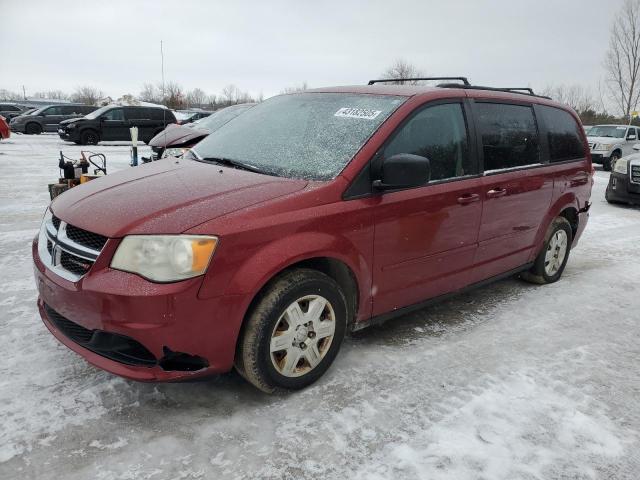 DODGE GRAND CARA 2011 with VIN 2D4RN4DG9BR730265 - Photo from auction