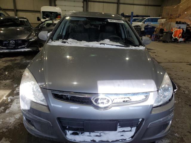 Photo 5 from auction – 2011 HYUNDAI ELANTRA TO with VIN KMHDB8AE7BU095572
