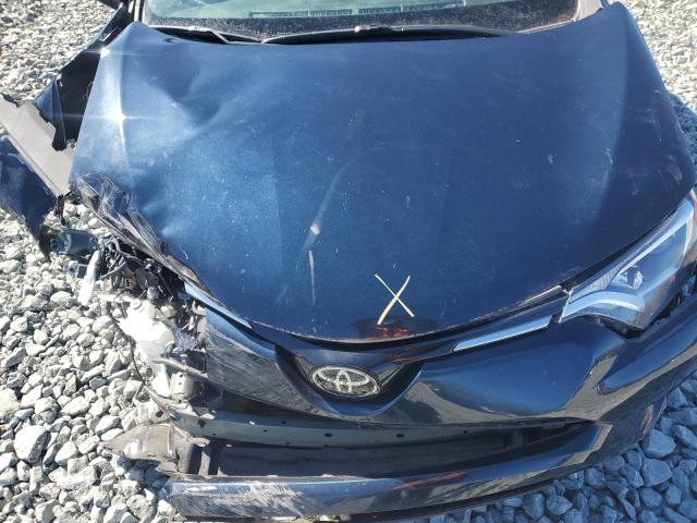 Photo 12 from auction – 2018 TOYOTA RAV4 LE with VIN 2T3ZFREV7JW469517