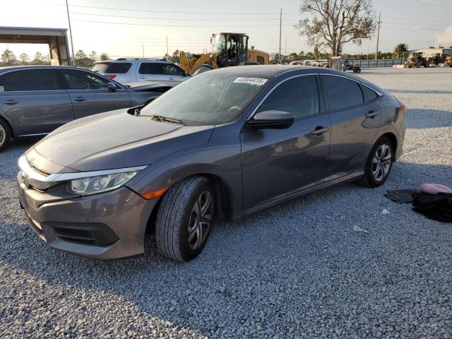 Photo 1 from auction – 2018 HONDA CIVIC LX with VIN 2HGFC2F59JH585949