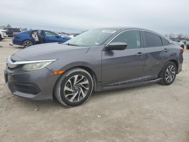 HONDA CIVIC EX 2016 with VIN 19XFC2F7XGE229904 - Photo from auction