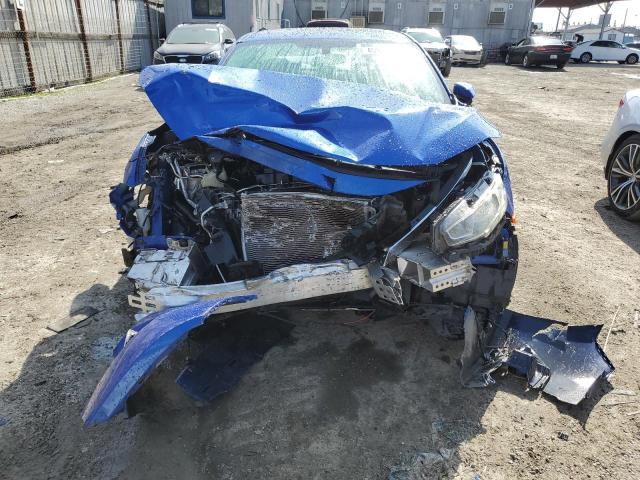 Photo 5 from auction – 2018 HONDA CIVIC EX with VIN 2HGFC2F77JH507199