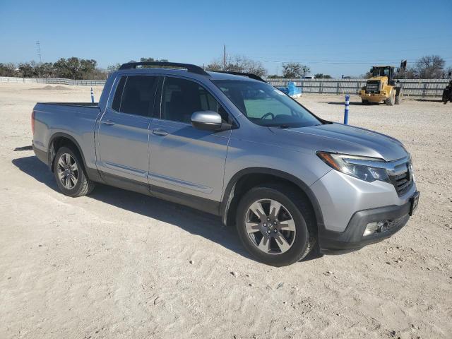 Photo 4 from auction – 2017 HONDA RIDGELINE with VIN 5FPYK2F5XHB007702